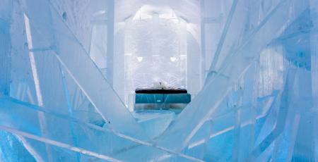 bedroom in suite filled with beautiful abstact art of ice and snow