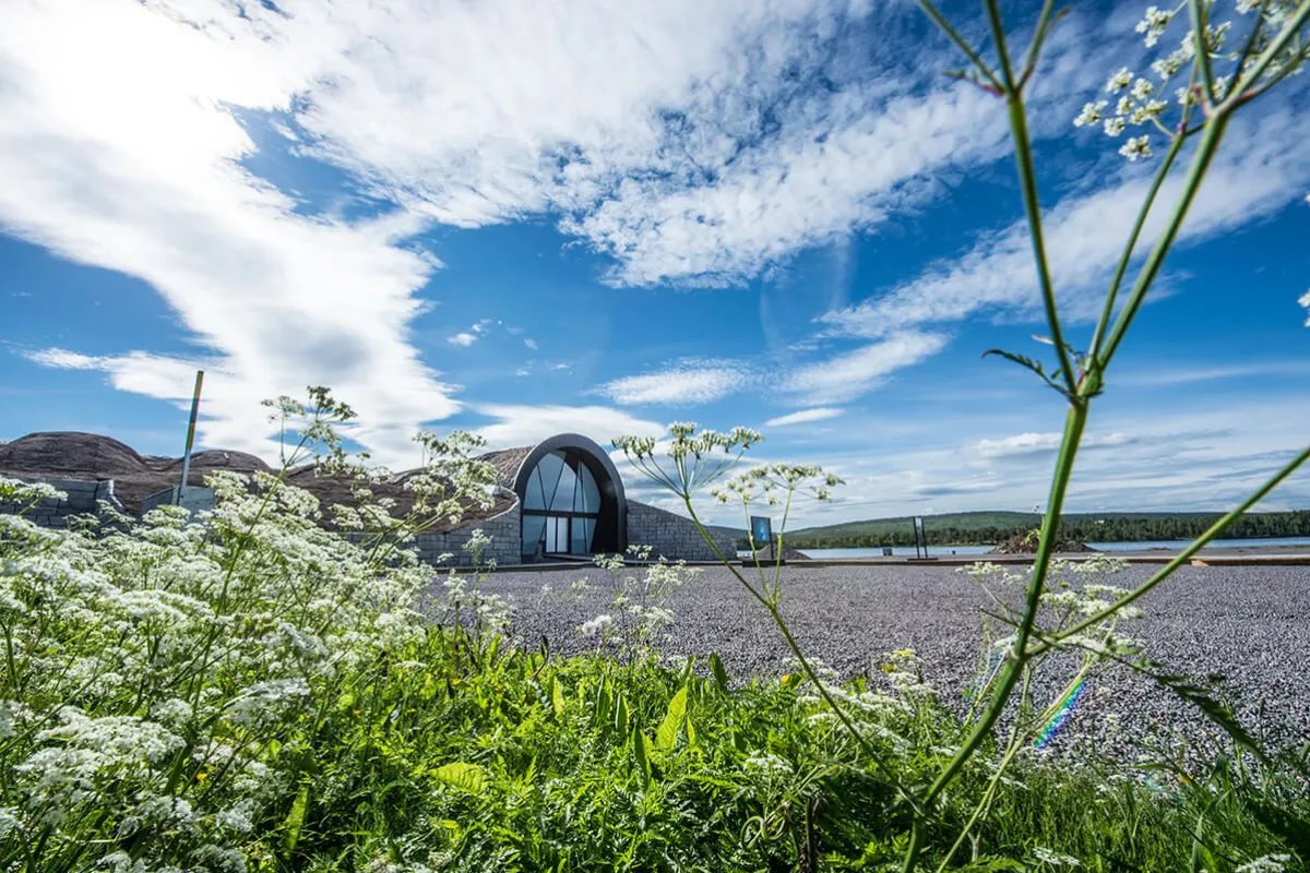 Entrance of Icehotel 365 with flowers