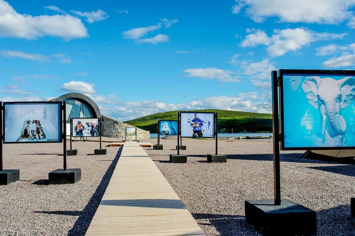 Photo exhibition outside Icehotel in summer