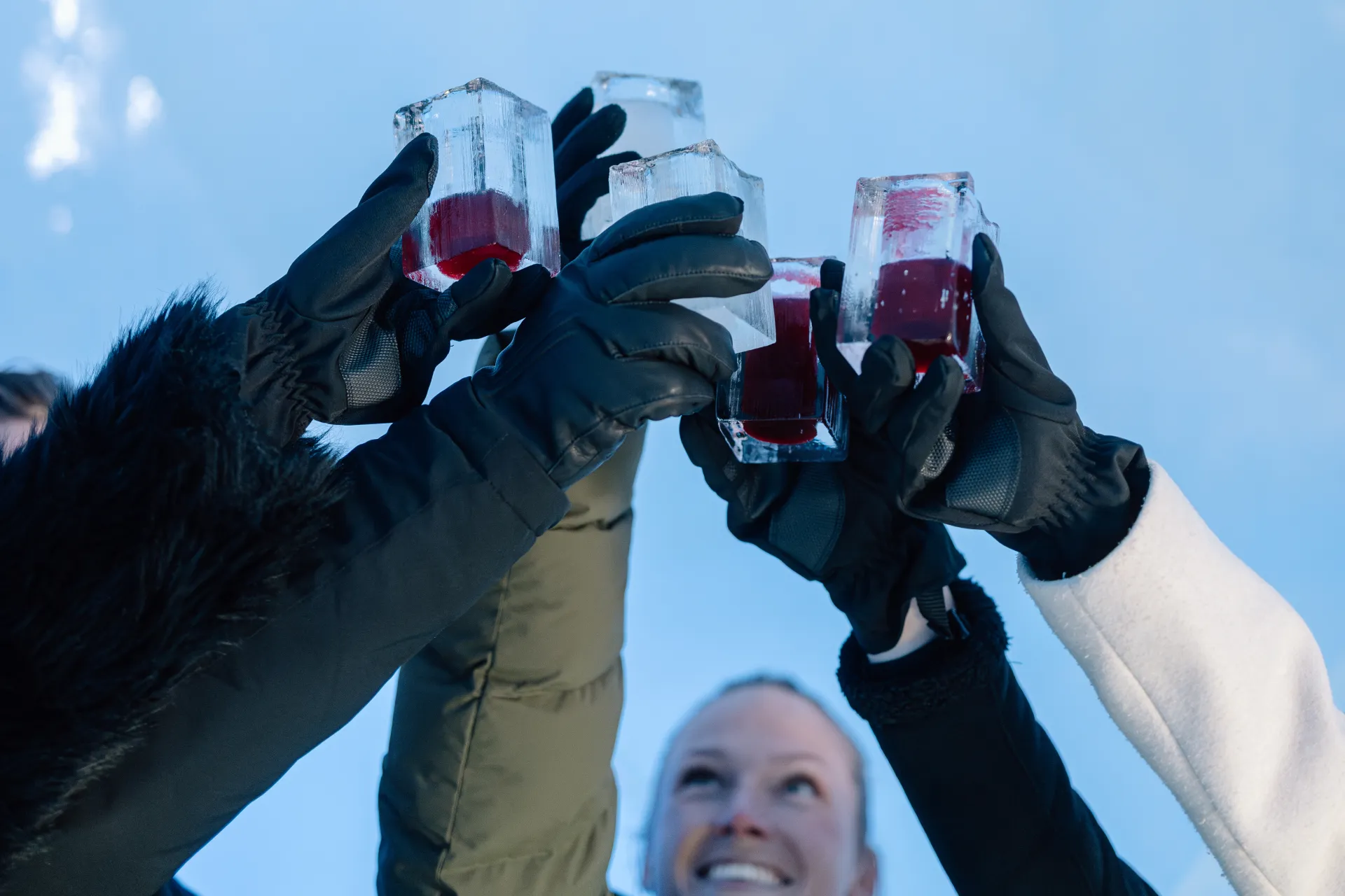 people celebrating in ice bar with ice drink