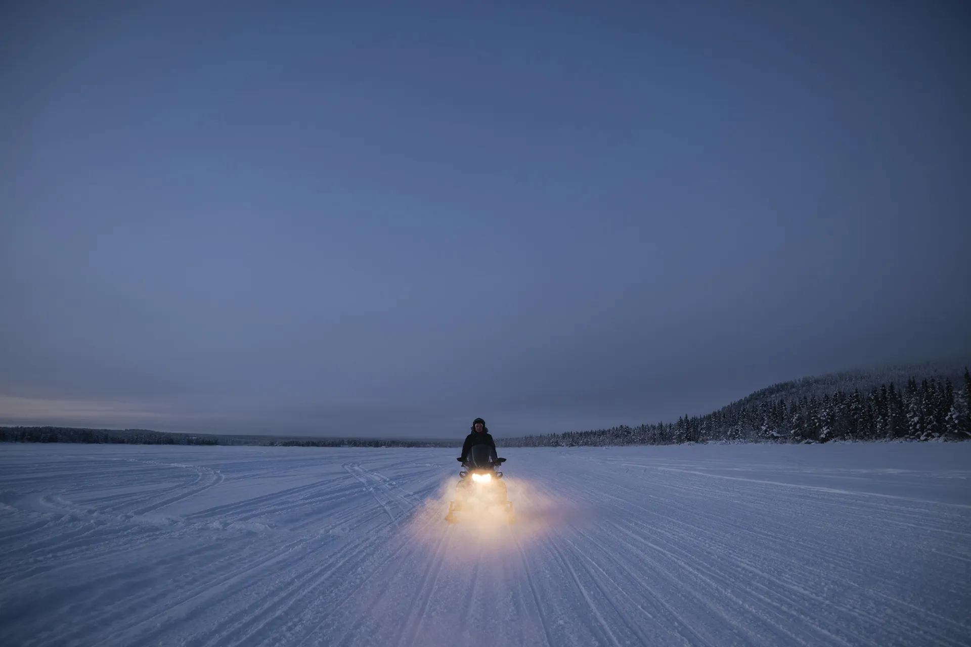 Snowmobile in winter landscape