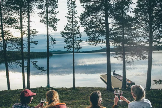 group of people looking out over the river
